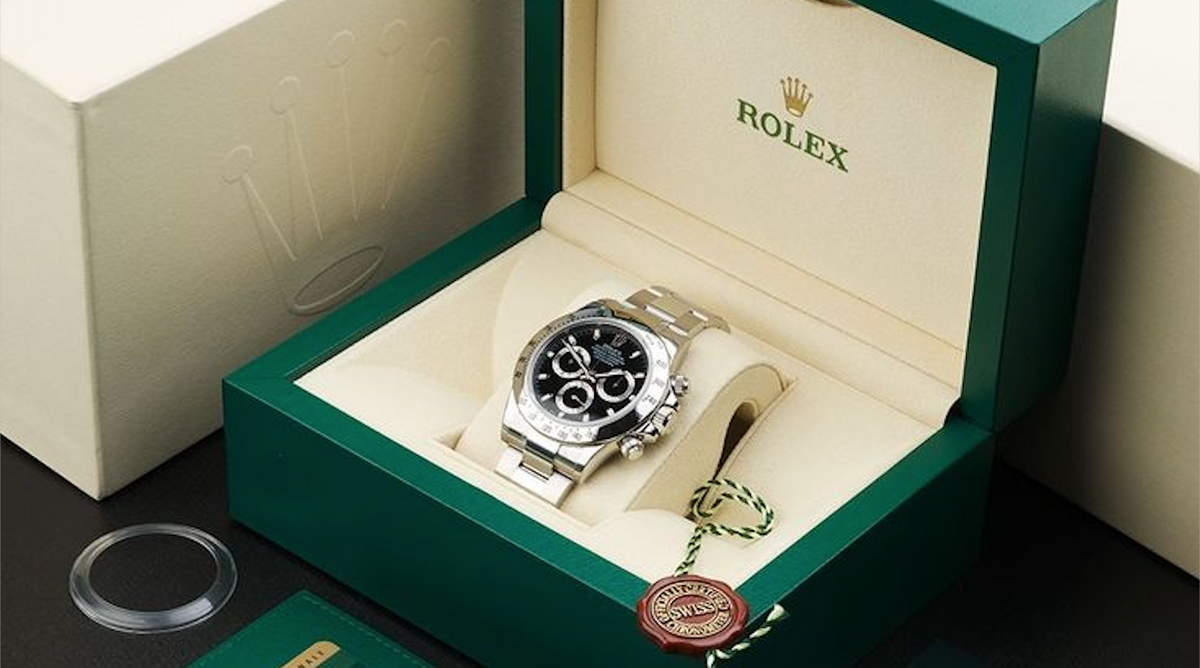 Watch repair technician polishing and restoring a scratched watch case