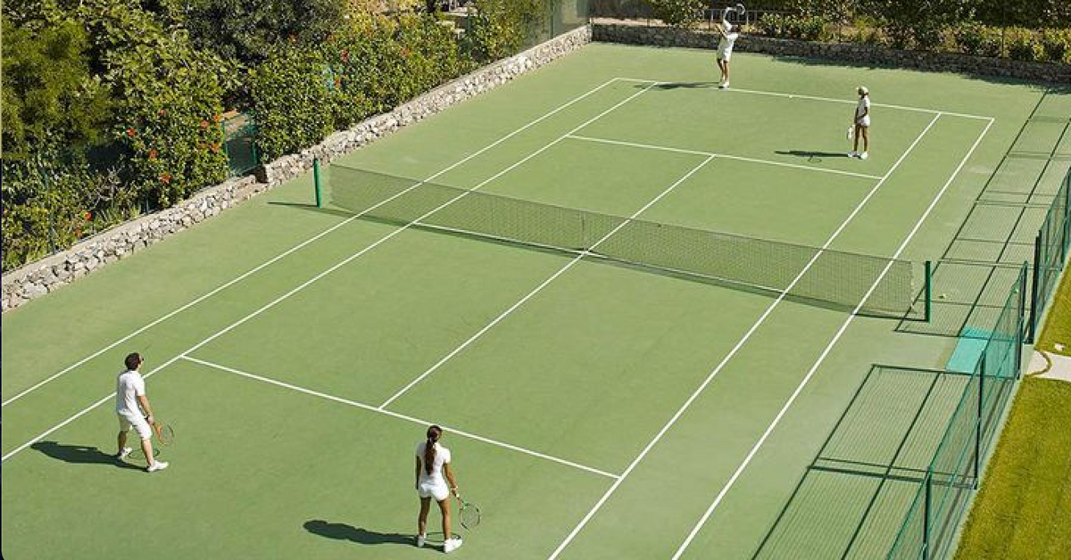 Wimbledon 2025 Centre Court view with iconic green grass and Rolex branding