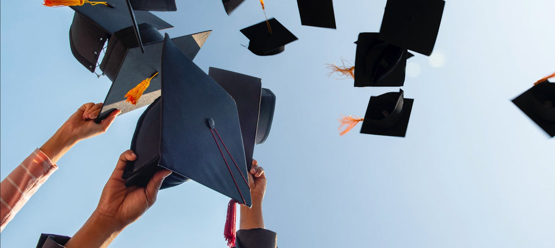 Graduation hats soaring into the sky, celebrating a joyful milestone with friends and family—symbolizing success, freedom, and new beginnings