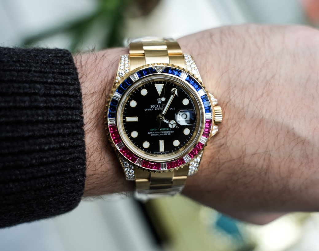 Rolex GMT-Master II 116758SARU 18K Yellow Gold Black Dial