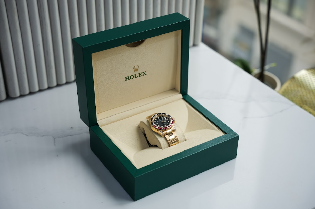 Rolex GMT-Master II 116758SARU 18K Yellow Gold Black Dial