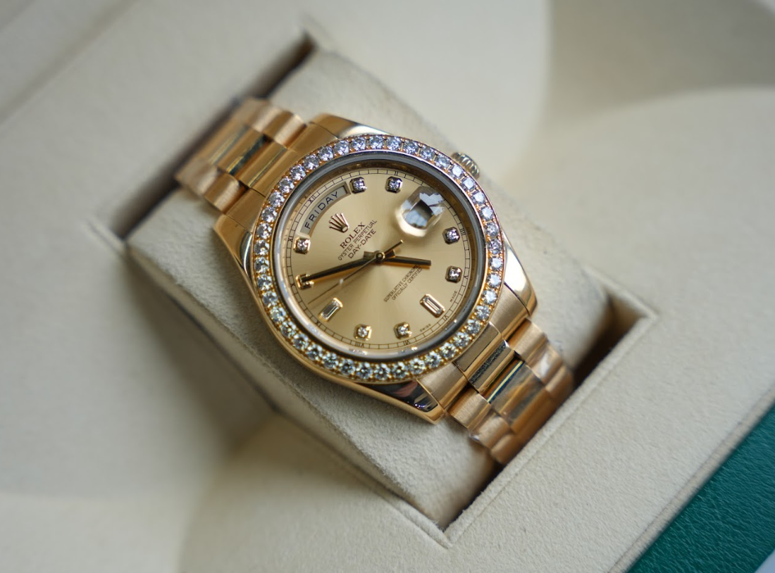 Rolex Day-Date II 218348 – 41mm 18K Yellow Gold – Champagne Baguette Diamond Dial