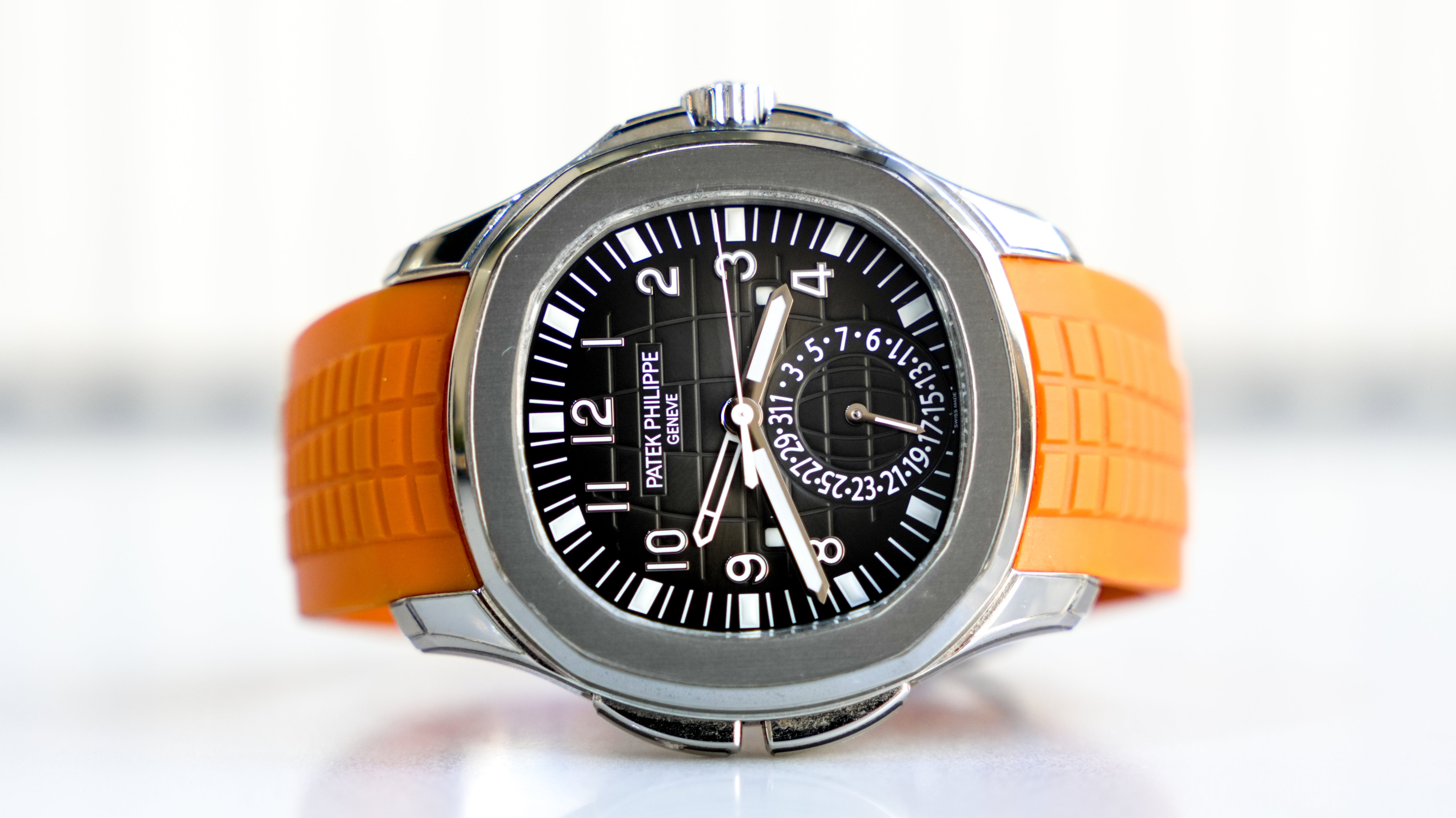 Patek Philippe Aquanaut Travel Time 5164A-001 – Stainless Steel with Orange Rubber Strap