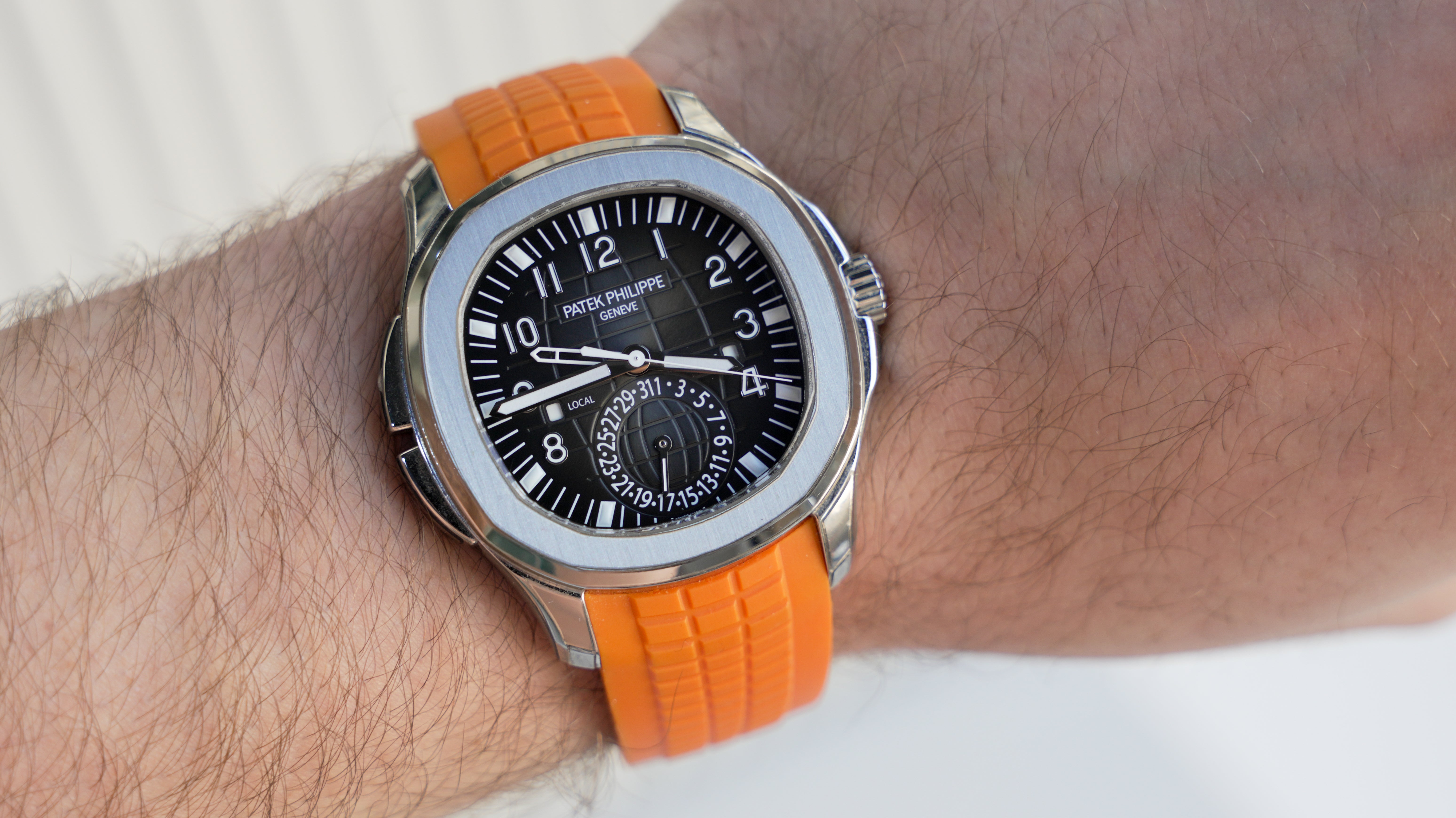 Patek Philippe Aquanaut Travel Time 5164A-001 – Stainless Steel with Orange Rubber Strap