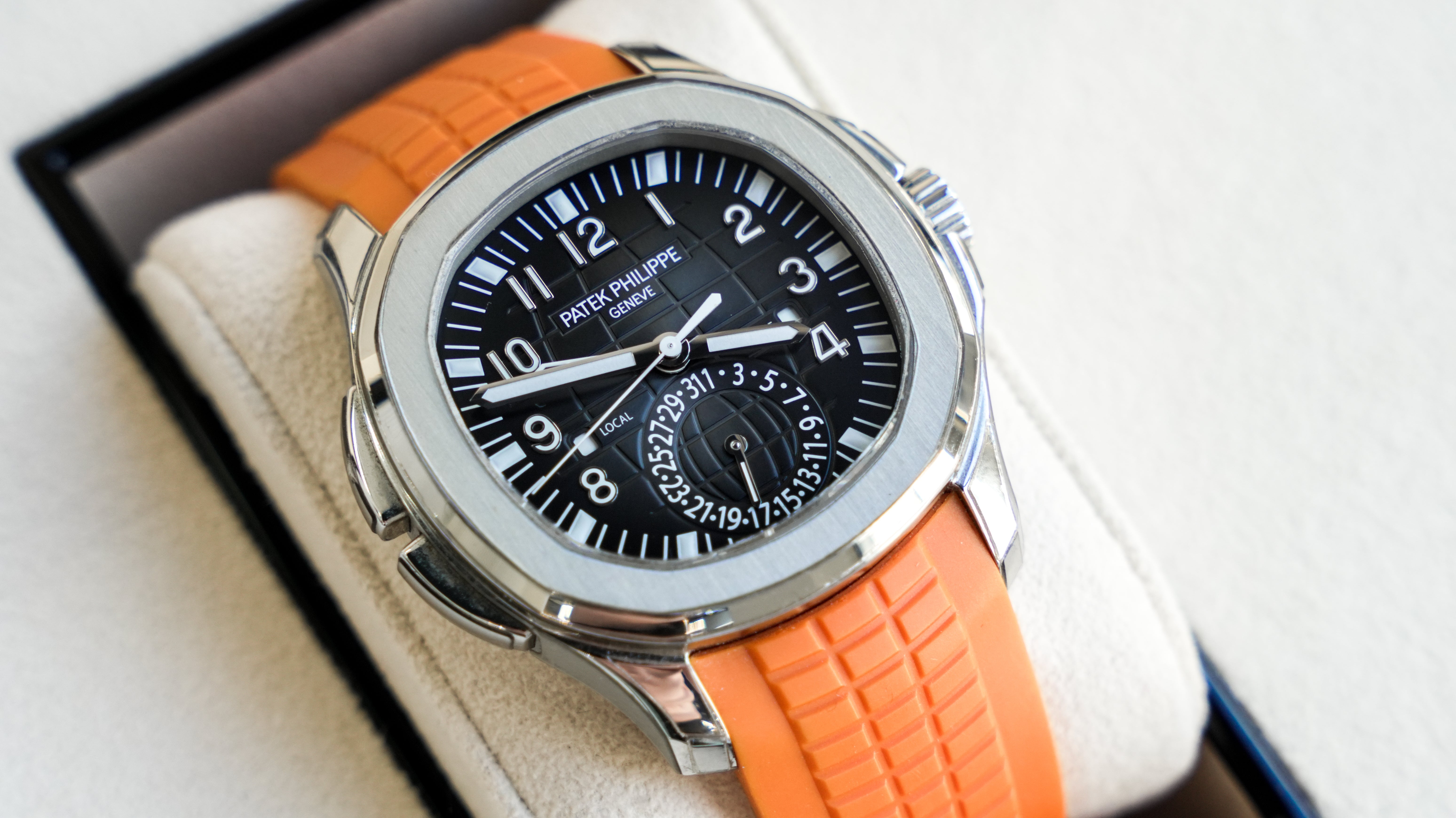 Patek Philippe Aquanaut Travel Time 5164A-001 – Stainless Steel with Orange Rubber Strap