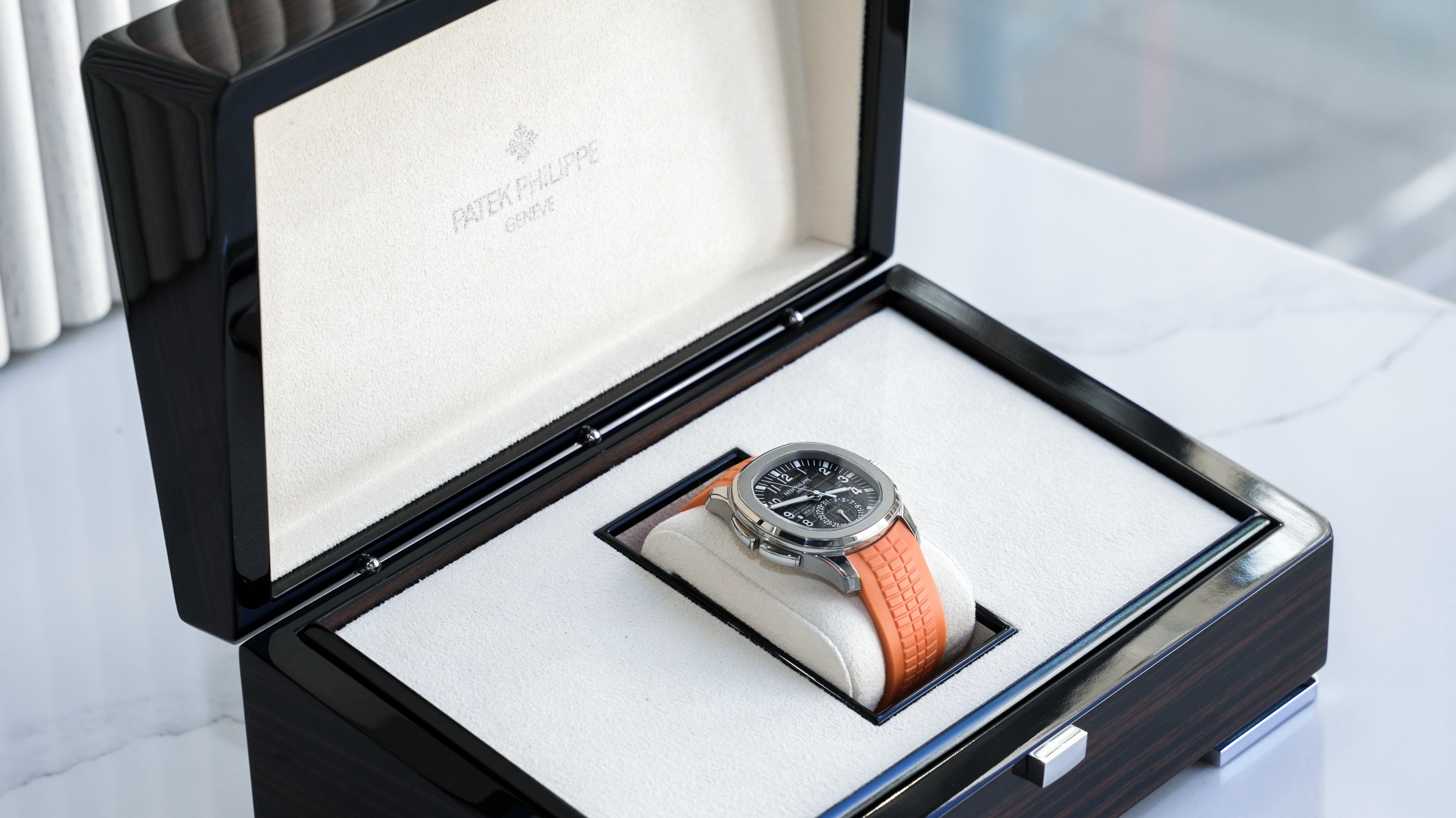Patek Philippe Aquanaut Travel Time 5164A-001 – Stainless Steel with Orange Rubber Strap