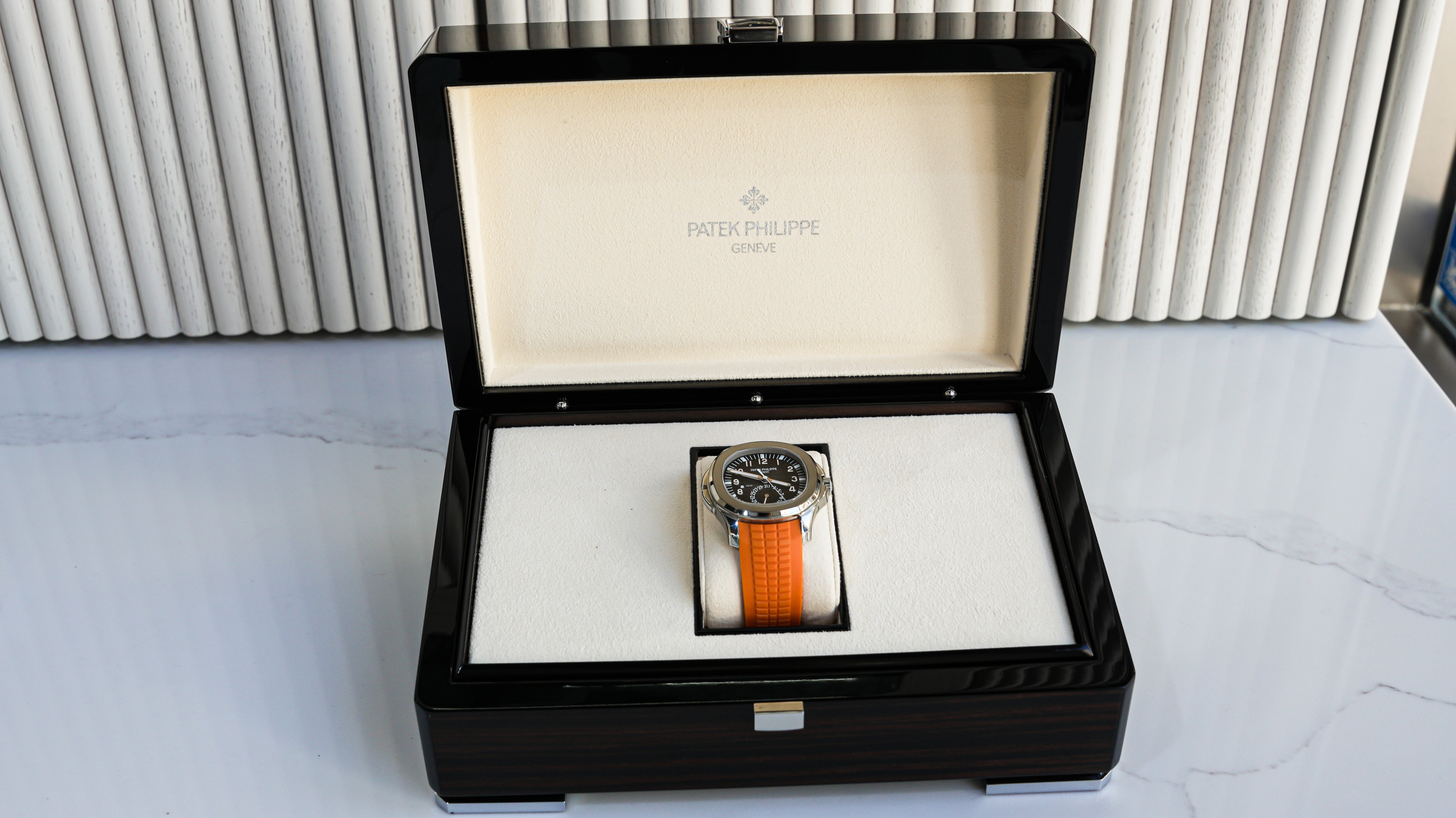 Patek Philippe Aquanaut Travel Time 5164A-001 – Stainless Steel with Orange Rubber Strap