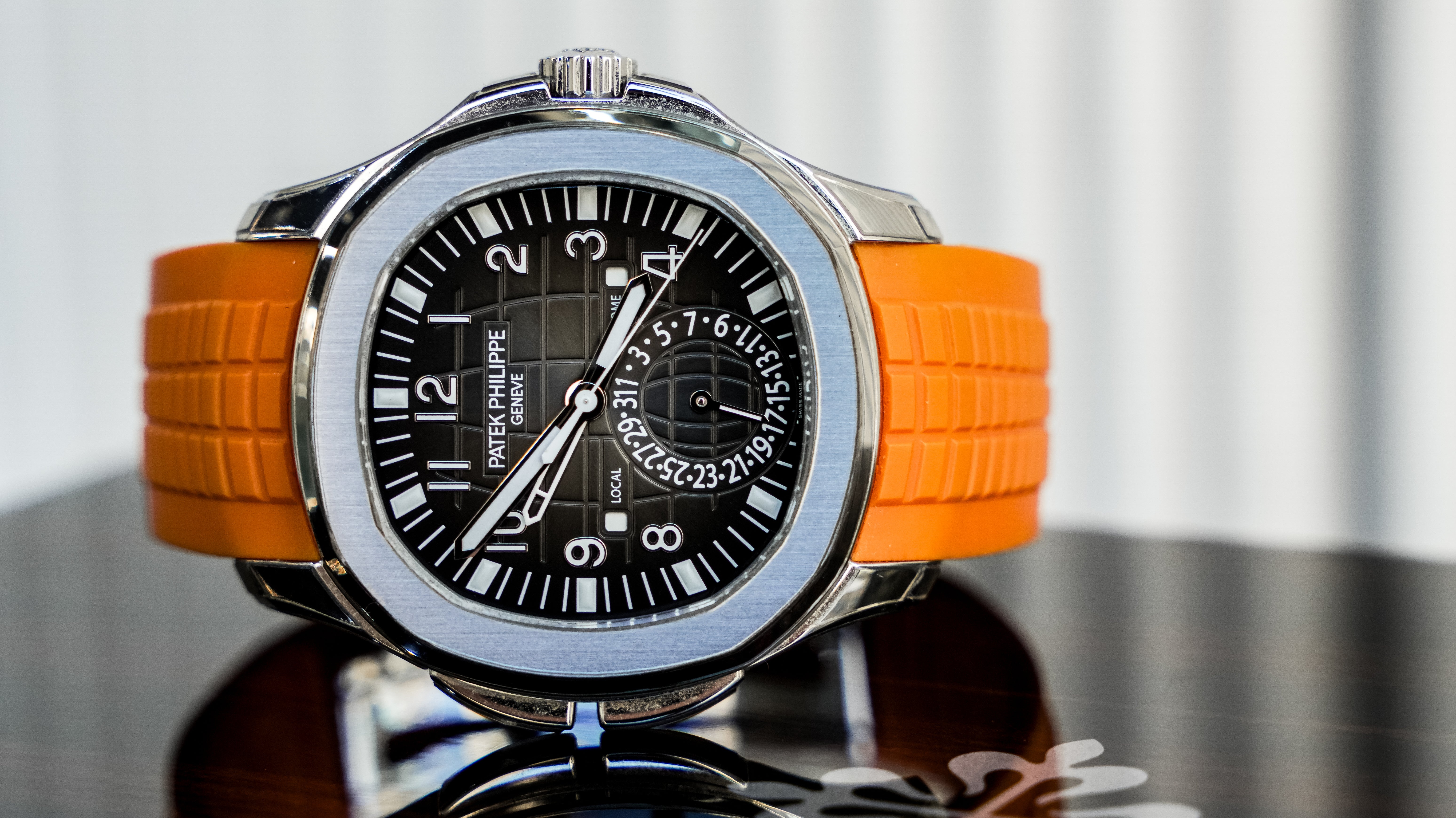 Patek Philippe Aquanaut Travel Time 5164A-001 – Stainless Steel with Orange Rubber Strap