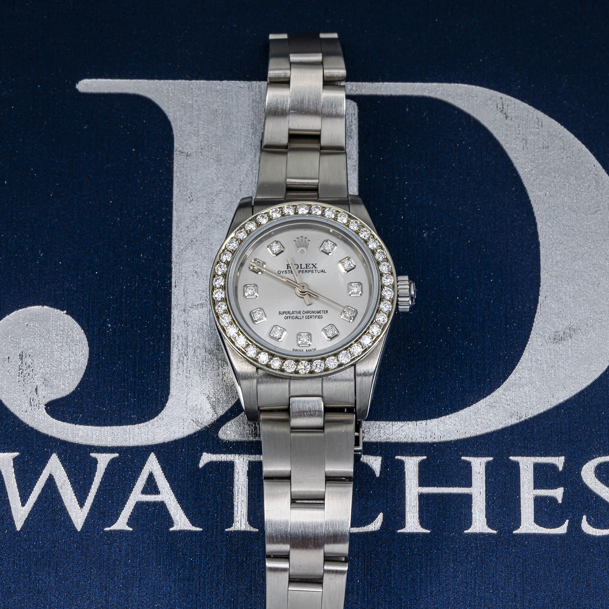 Rolex 76080 Silver Diamond Dial w/ Aftermarket Diamond Bezel