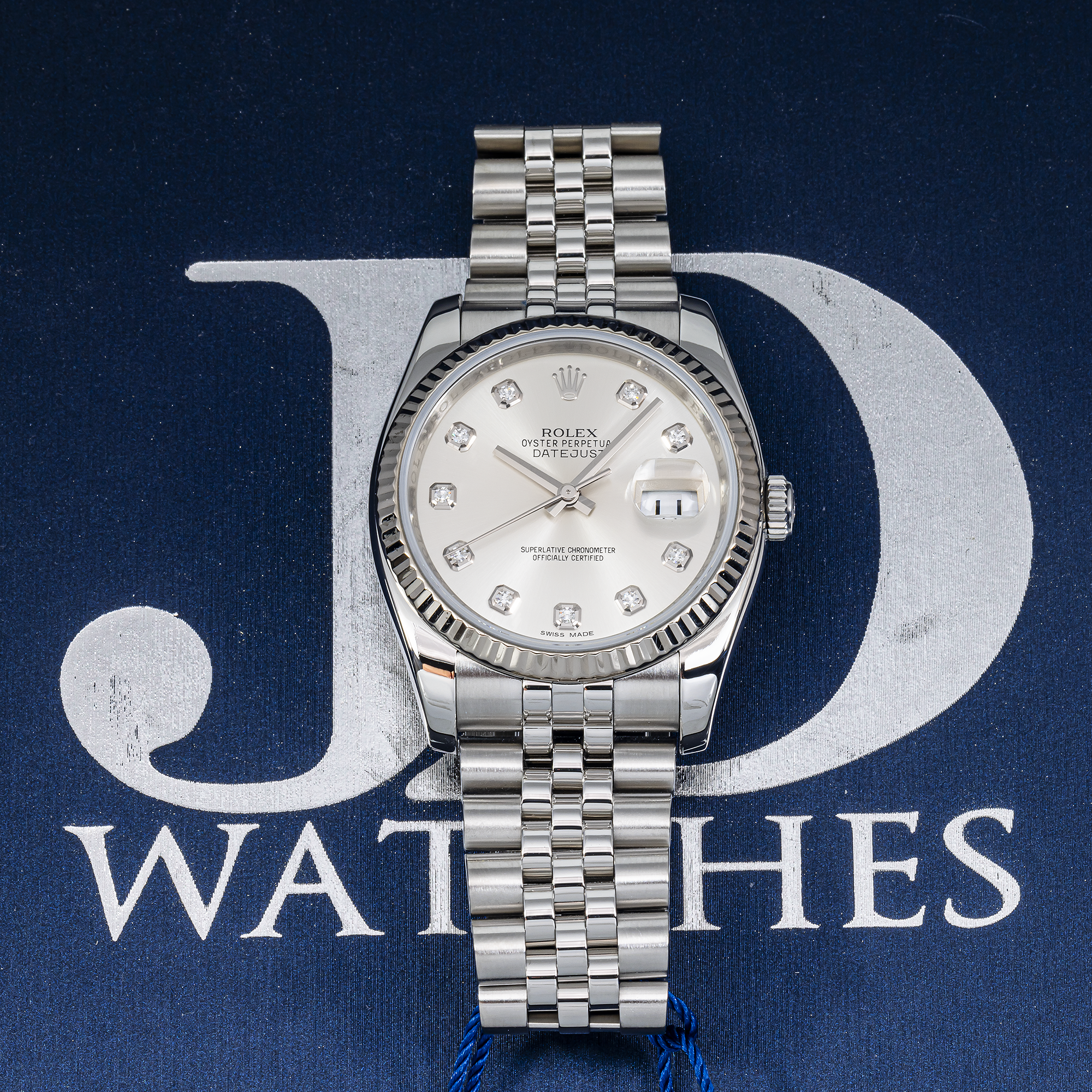 Rolex Datejust 116234 36mm – Silver Diamond Dial & 18K White Gold Fluted Bezel