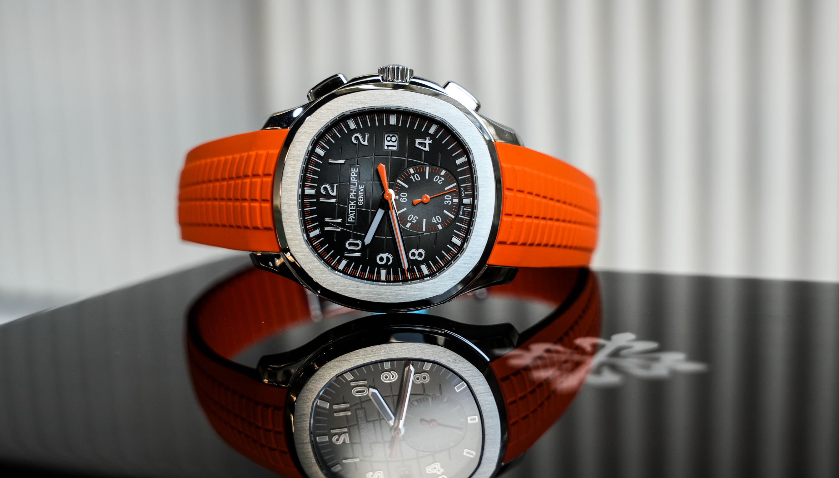 Patek Philippe Aquanaut Chronograph 5968A-001 – Stainless Steel – Black Embossed Dial – Orange Rubber Strap
