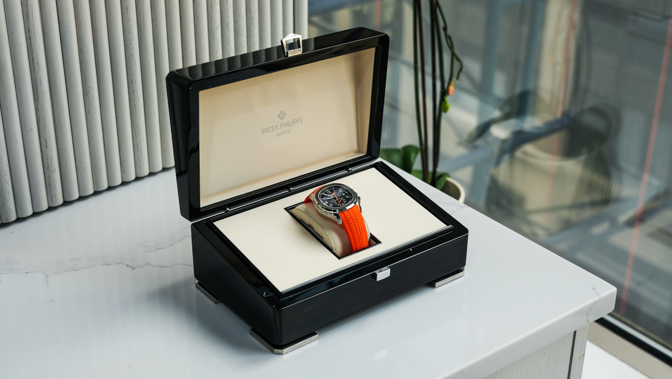 Patek Philippe Aquanaut Chronograph 5968A-001 – Stainless Steel – Black Embossed Dial – Orange Rubber Strap