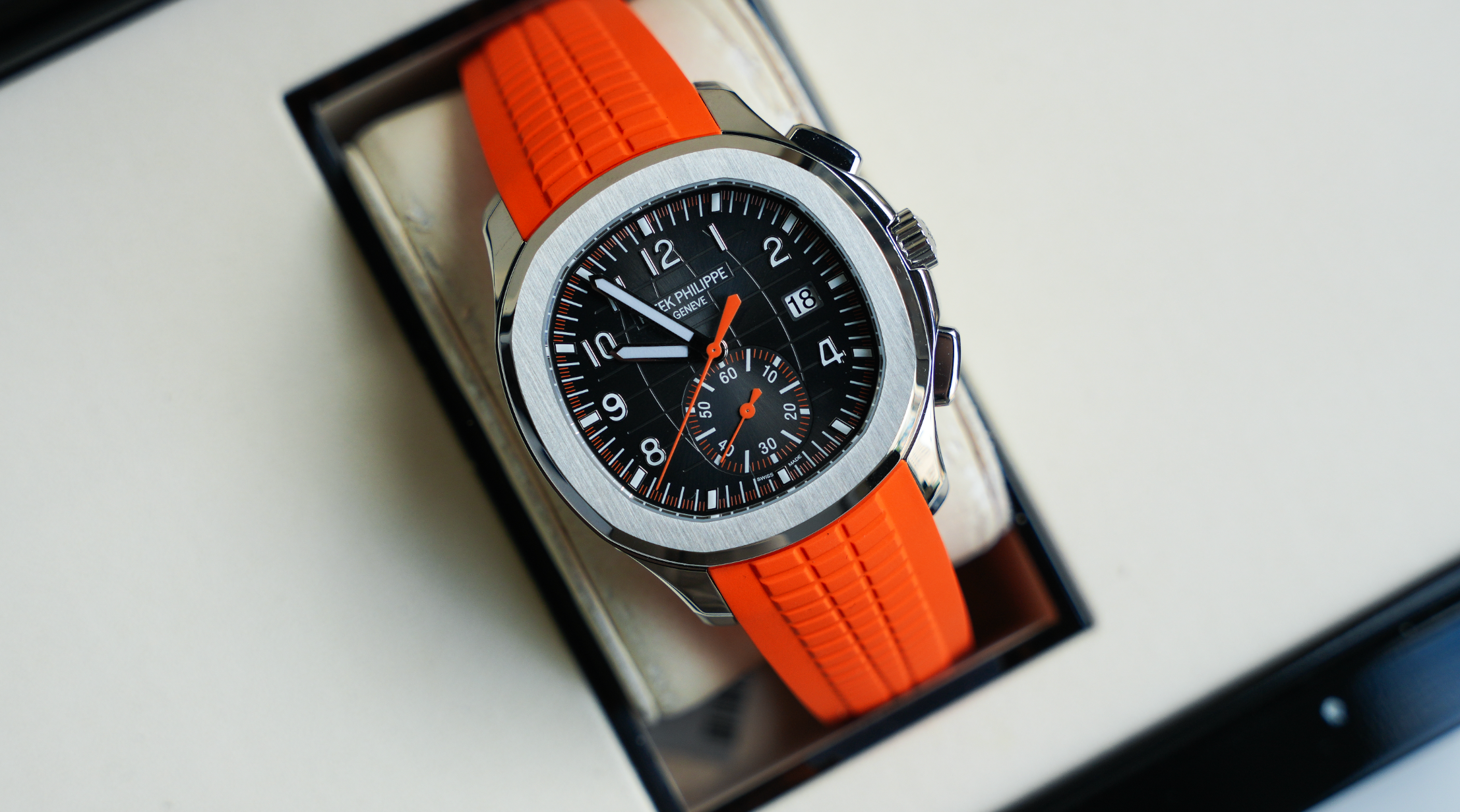 Patek Philippe Aquanaut Chronograph 5968A-001 – Stainless Steel – Black Embossed Dial – Orange Rubber Strap