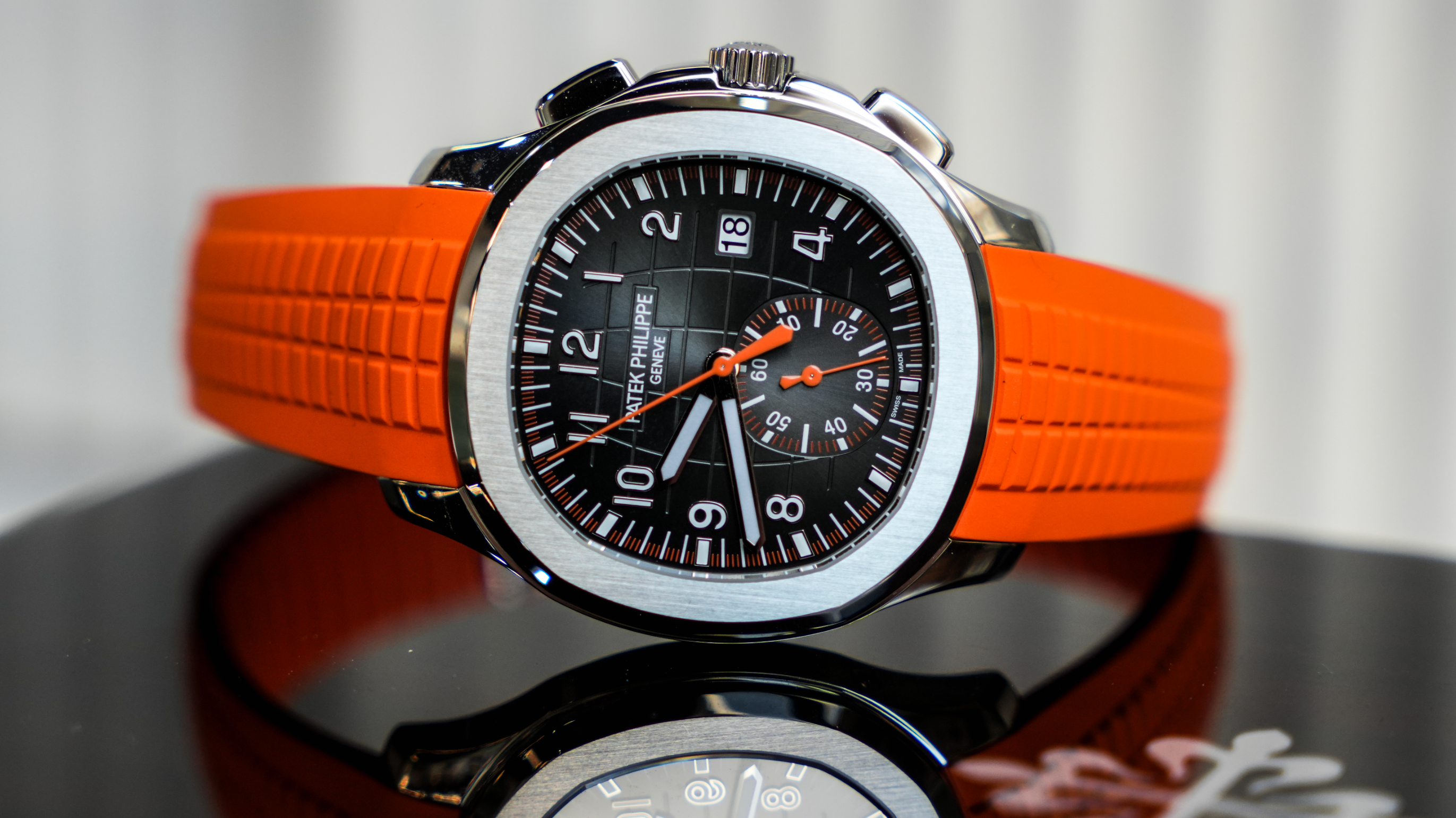 Patek Philippe Aquanaut Chronograph 5968A-001 – Stainless Steel – Black Embossed Dial – Orange Rubber Strap