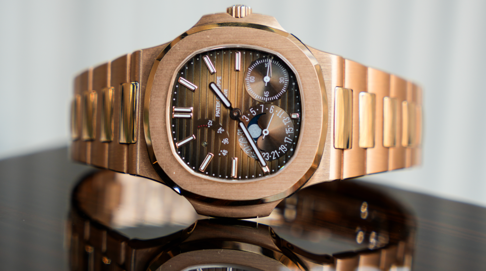 Patek Philippe Nautilus 5712-1R-001 40MM Sunburst Brown Dial With Rose Gold Bracelet-Patek Philippe-JD Watches NY