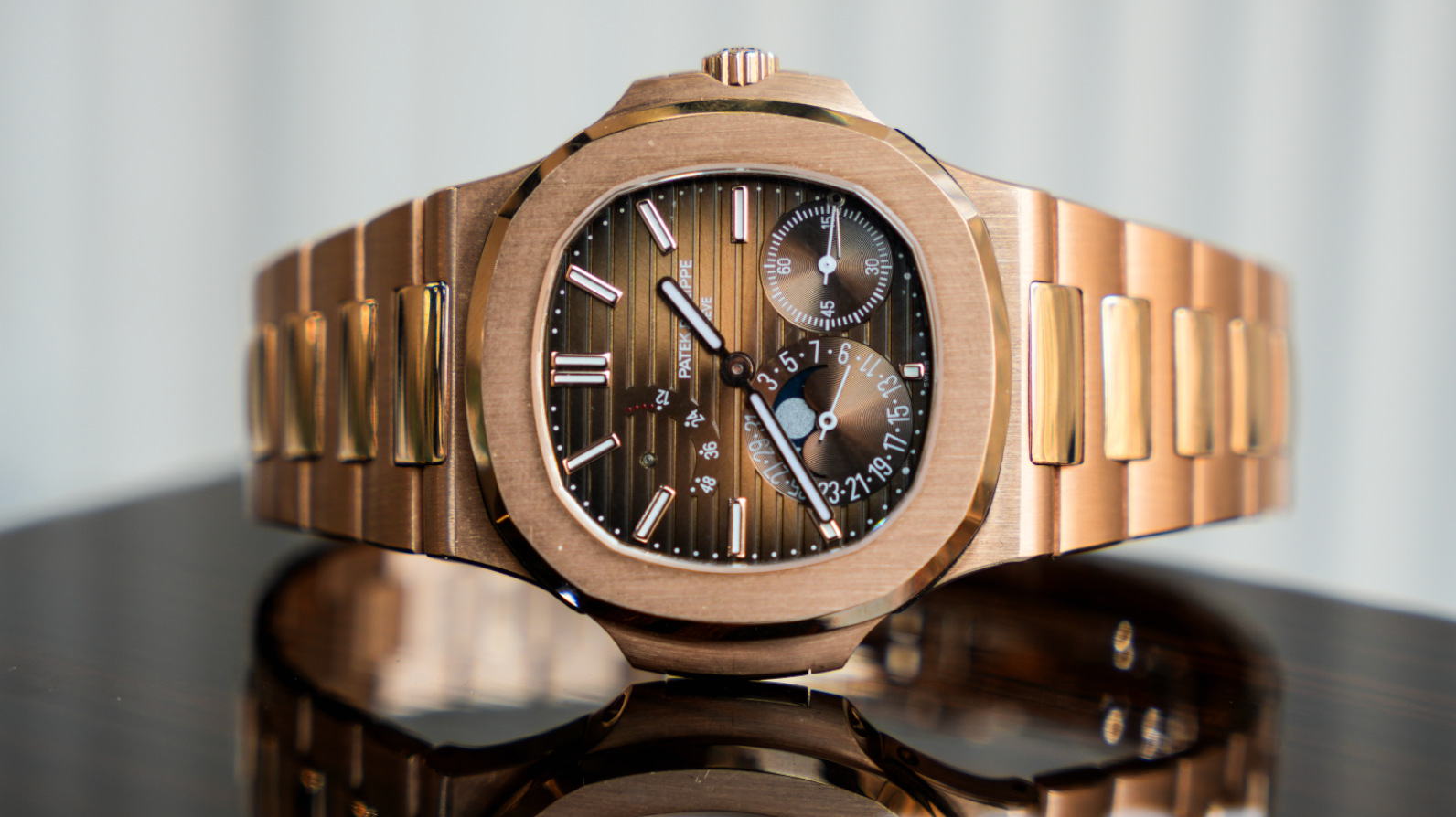 Patek Philippe Nautilus 5712-1R-001 40MM Sunburst Brown Dial With Rose Gold Bracelet-Patek Philippe-JD Watches NY