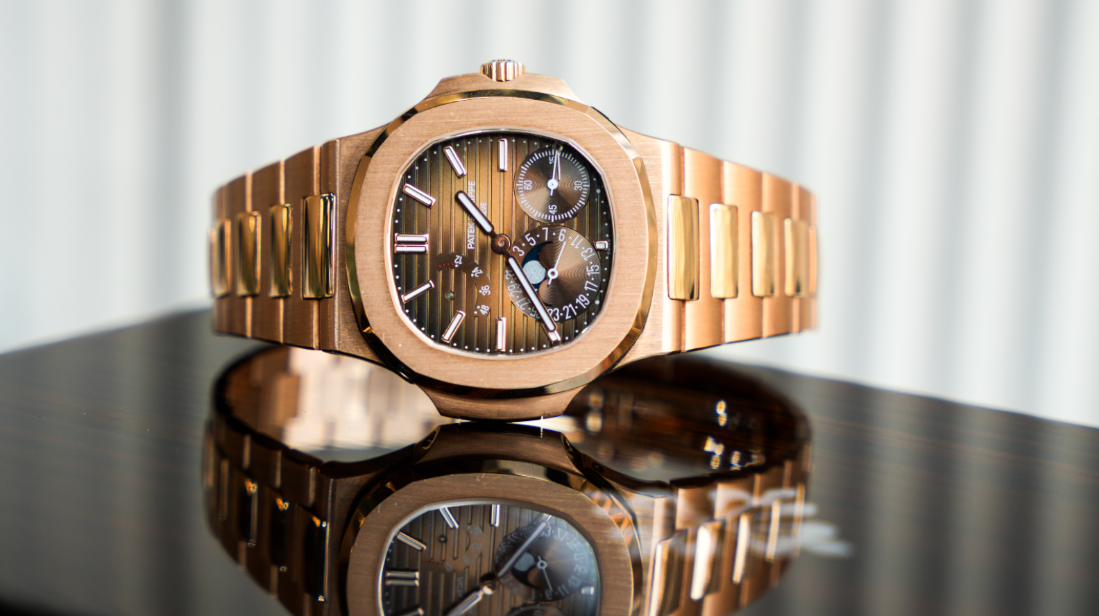 Patek Philippe Nautilus 5712-1R-001 40MM Sunburst Brown Dial With Rose Gold Bracelet-Patek Philippe-JD Watches NY