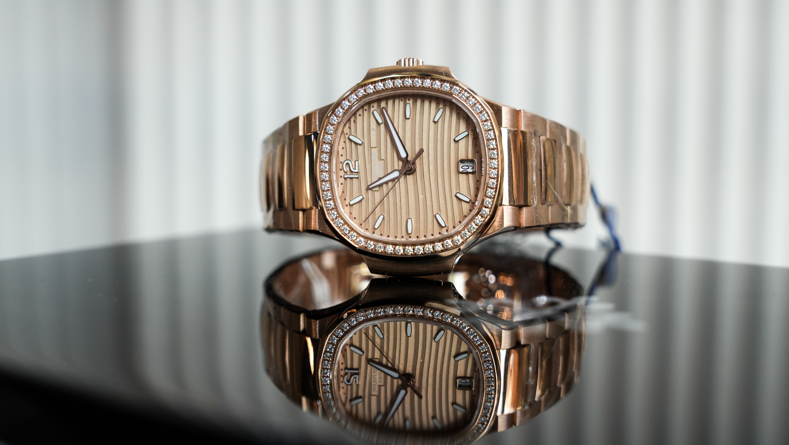 Patek Philippe Nautilus 7118/1200R-010 – 35mm Rose Gold – Brown Dial – Factory Diamond Bezel