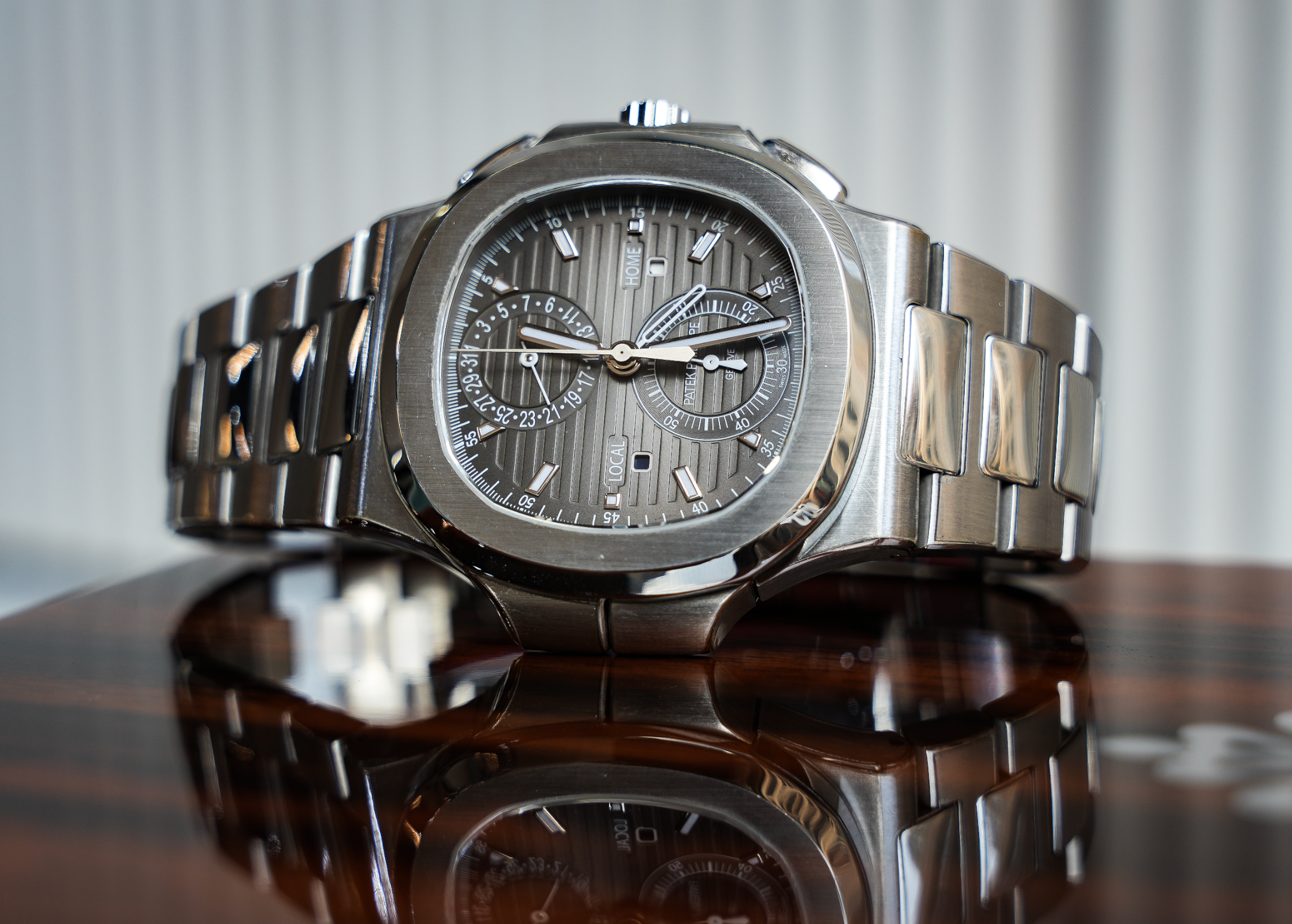 Patek Philippe Nautilus Travel Time Chronograph – Stainless Steel Ref. 5990/1A-001-JD Watches NY-JD Watches NY