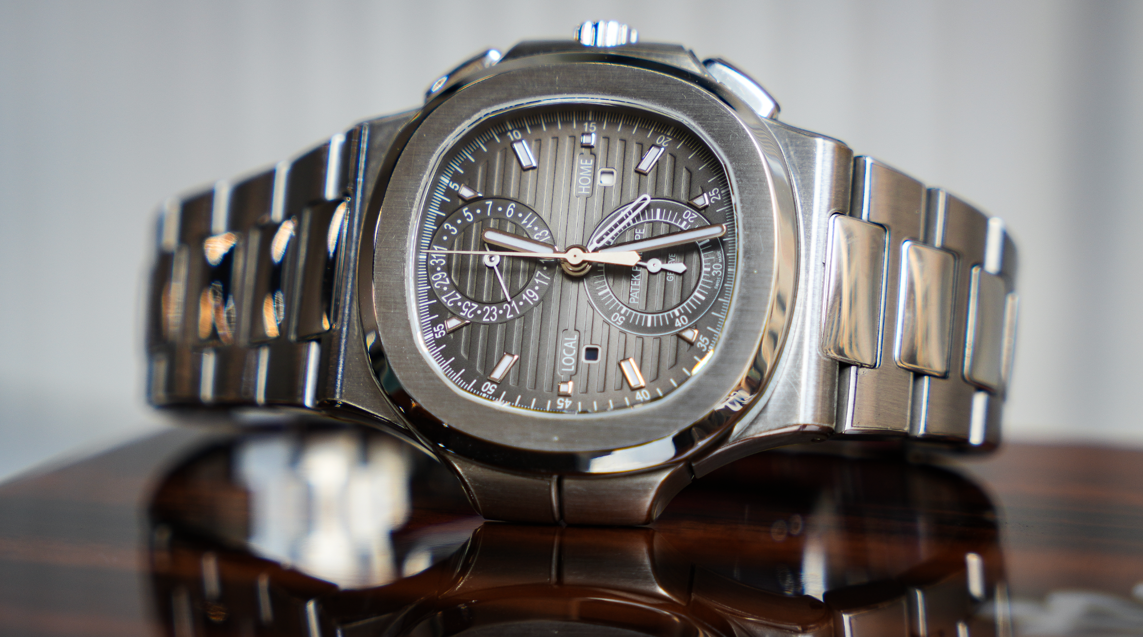 Patek Philippe Nautilus Travel Time Chronograph – Stainless Steel Ref. 5990/1A-001-JD Watches NY-JD Watches NY