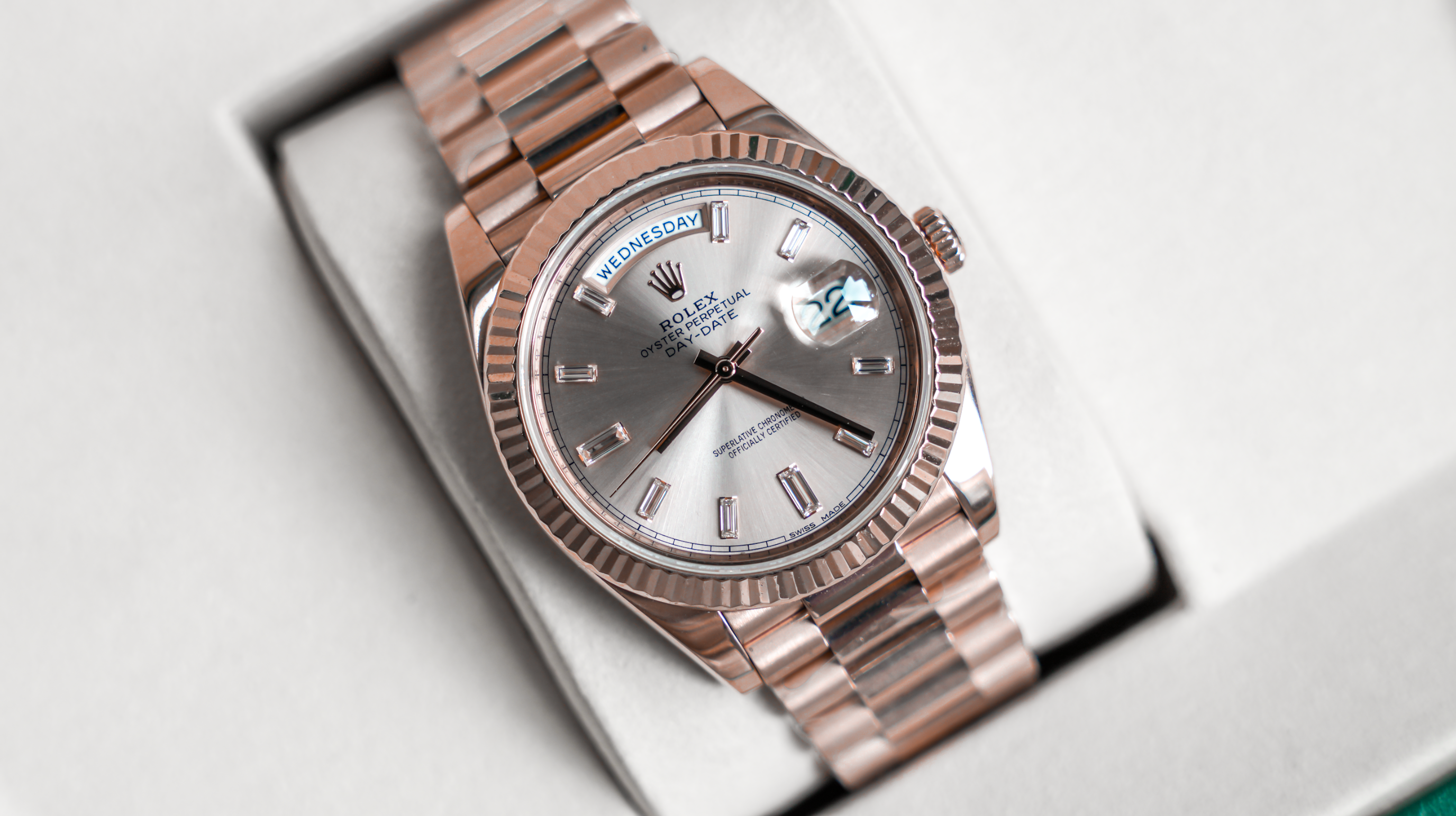 Rolex Day-Date 40 – 18k Everose Gold with Sundust Diamond Dial and President Bracelet Ref. 228235