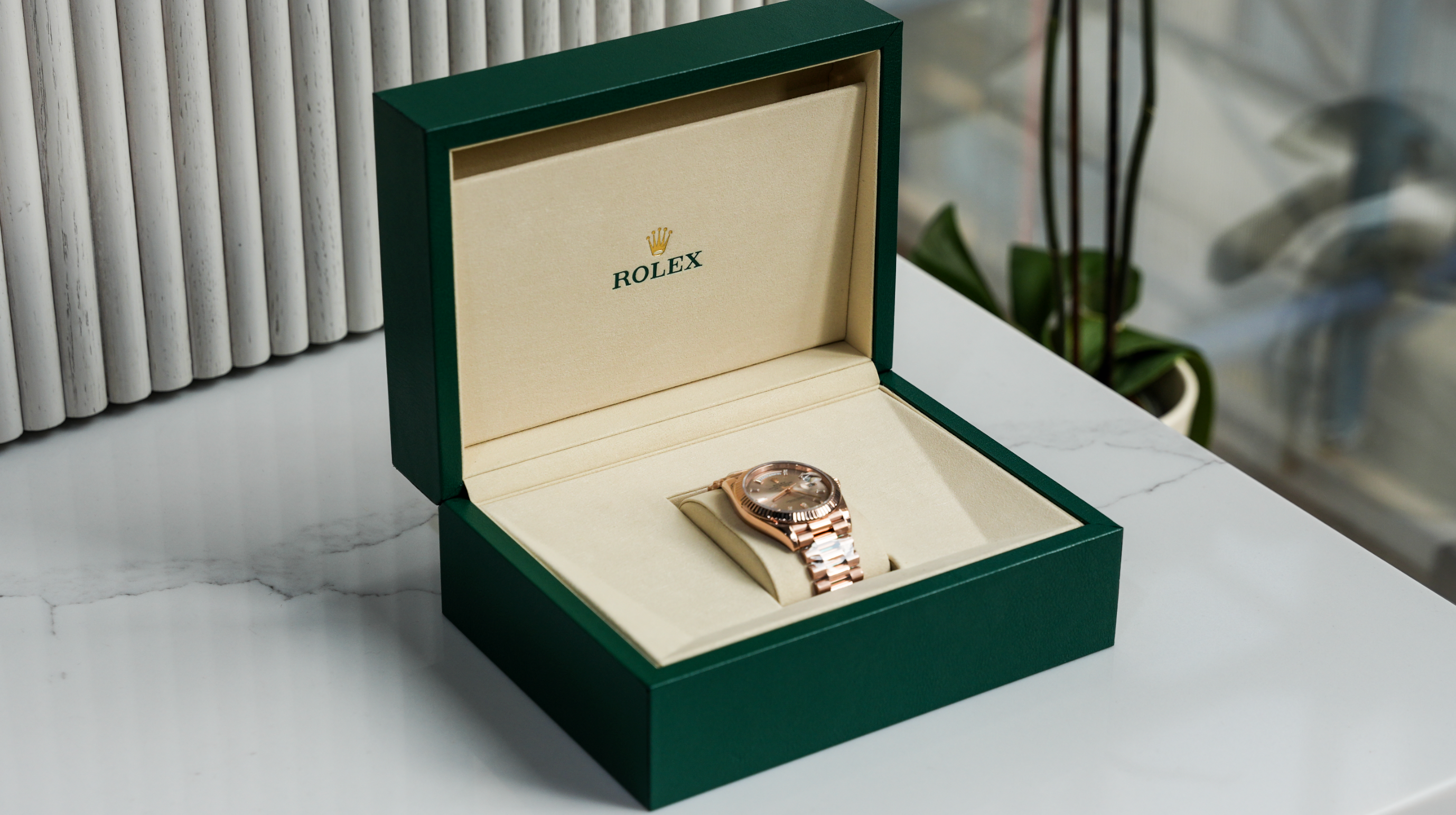 Rolex Day-Date 40 – 18k Everose Gold with Sundust Diamond Dial and President Bracelet Ref. 228235