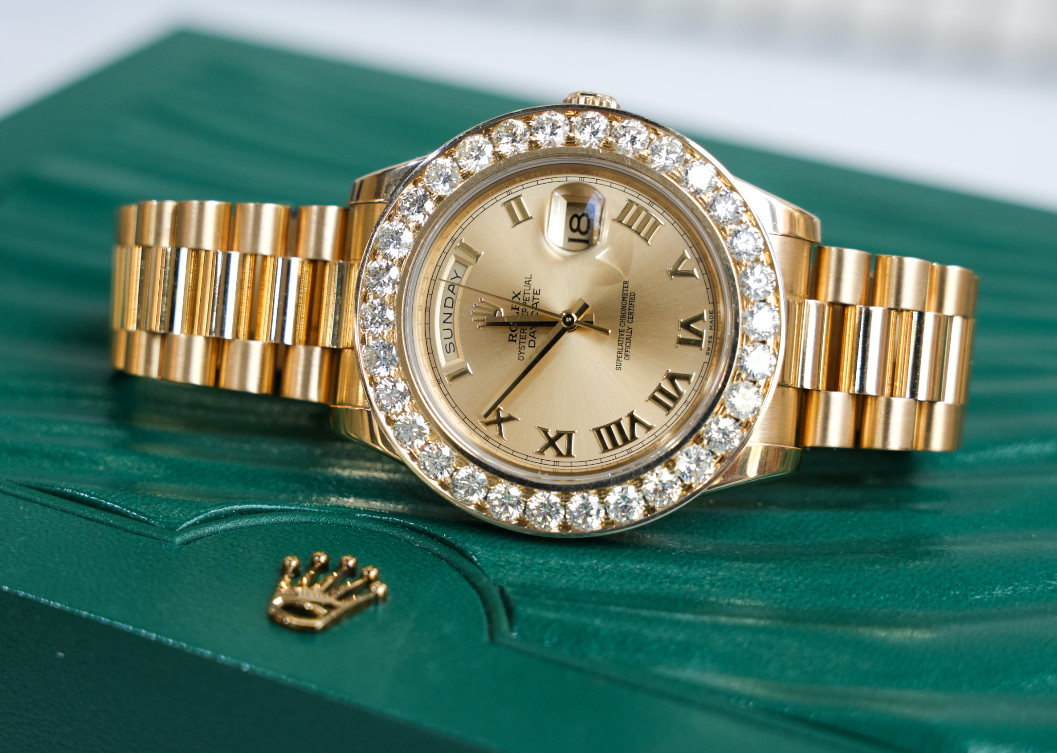 Rolex Day-Date 41 18k Yellow Gold Champagne Roman Dial – Ref. 218238 – Aftermarket Diamond Bezel