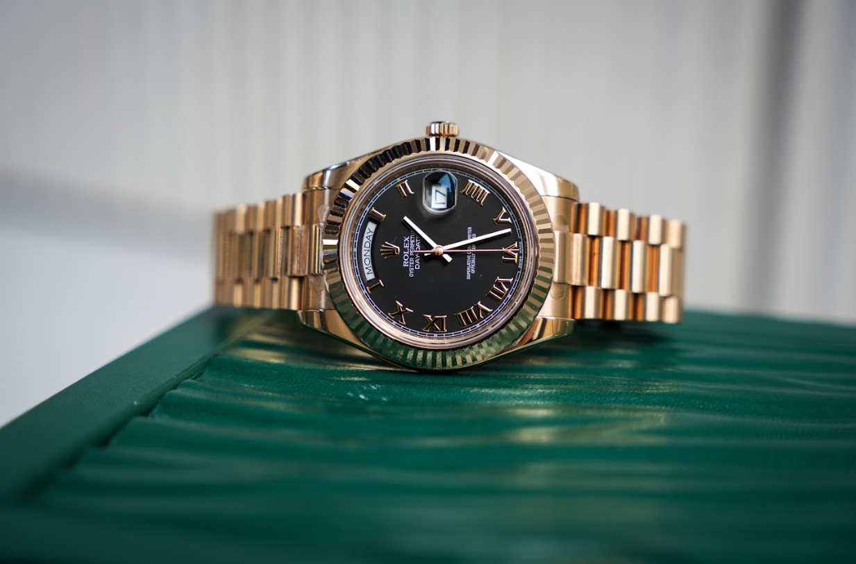 Rolex Day-Date II 218235 – 41mm 18K Rose Gold Black Roman Dial President Bracelet