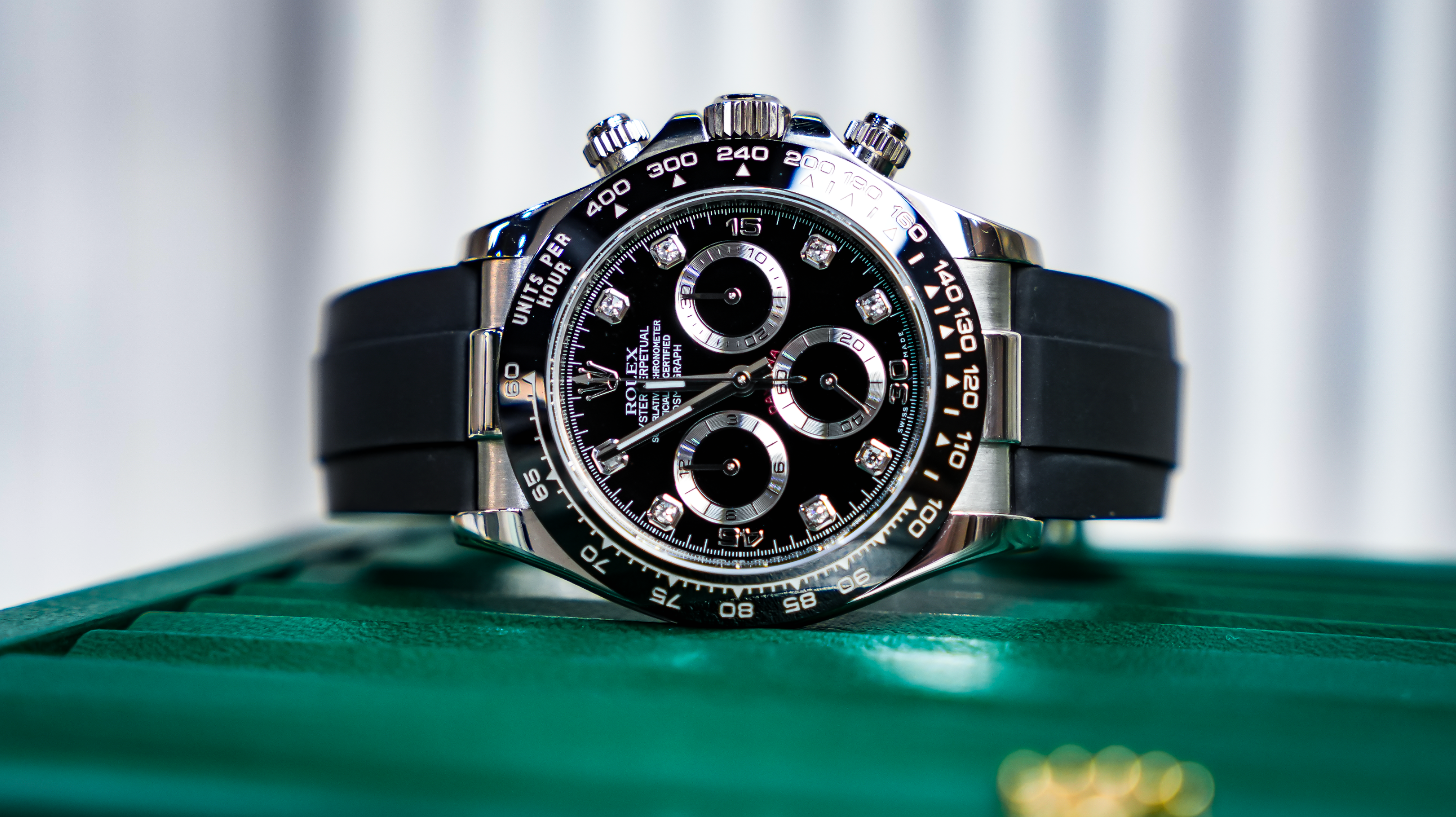 Rolex Cosmograph Daytona – Pre-Owned 18k White Gold with Black Diamond Dial and Oysterflex Bracelet Ref. 116519LN