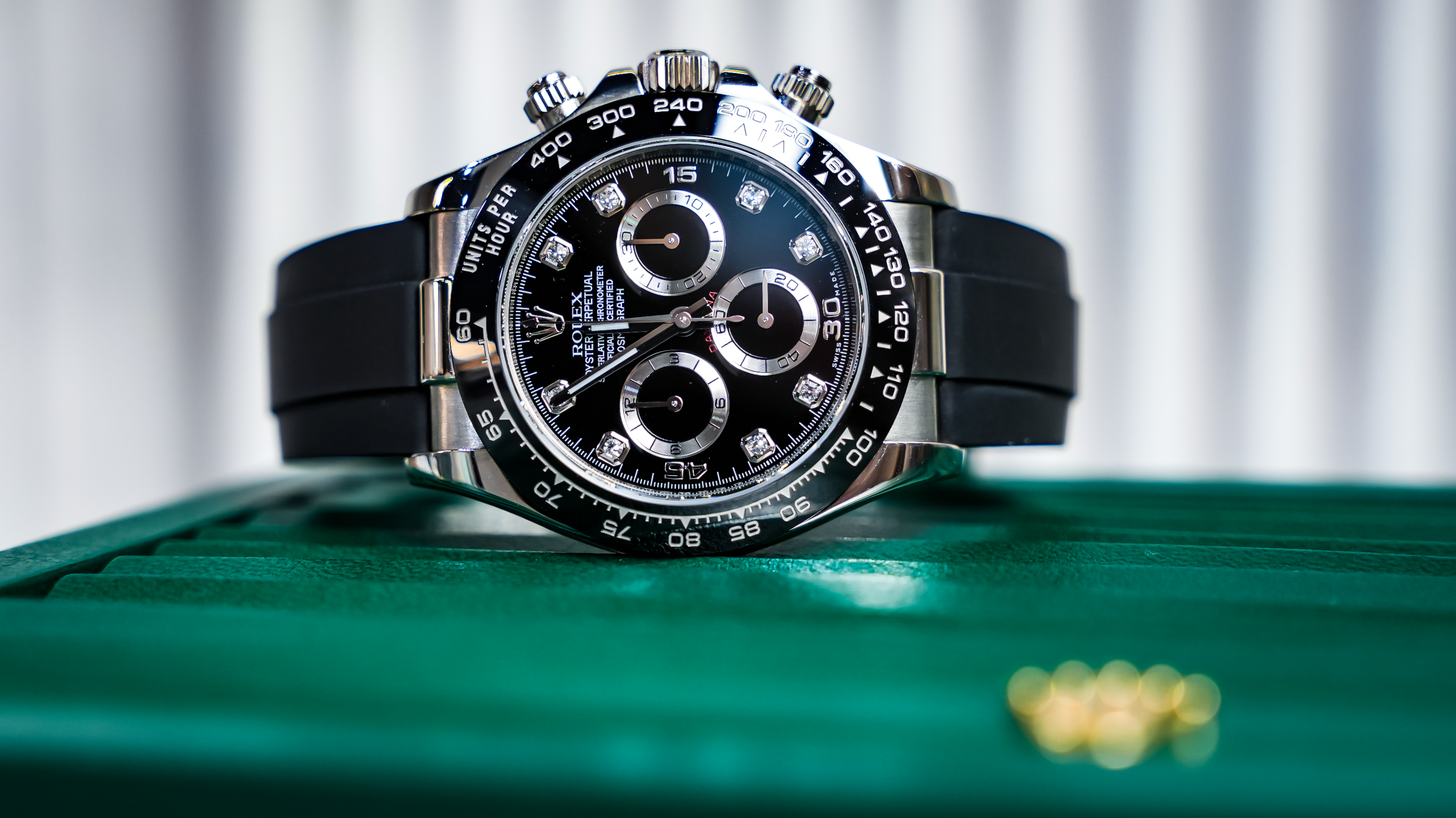Rolex Cosmograph Daytona – Pre-Owned 18k White Gold with Black Diamond Dial and Oysterflex Bracelet Ref. 116519LN