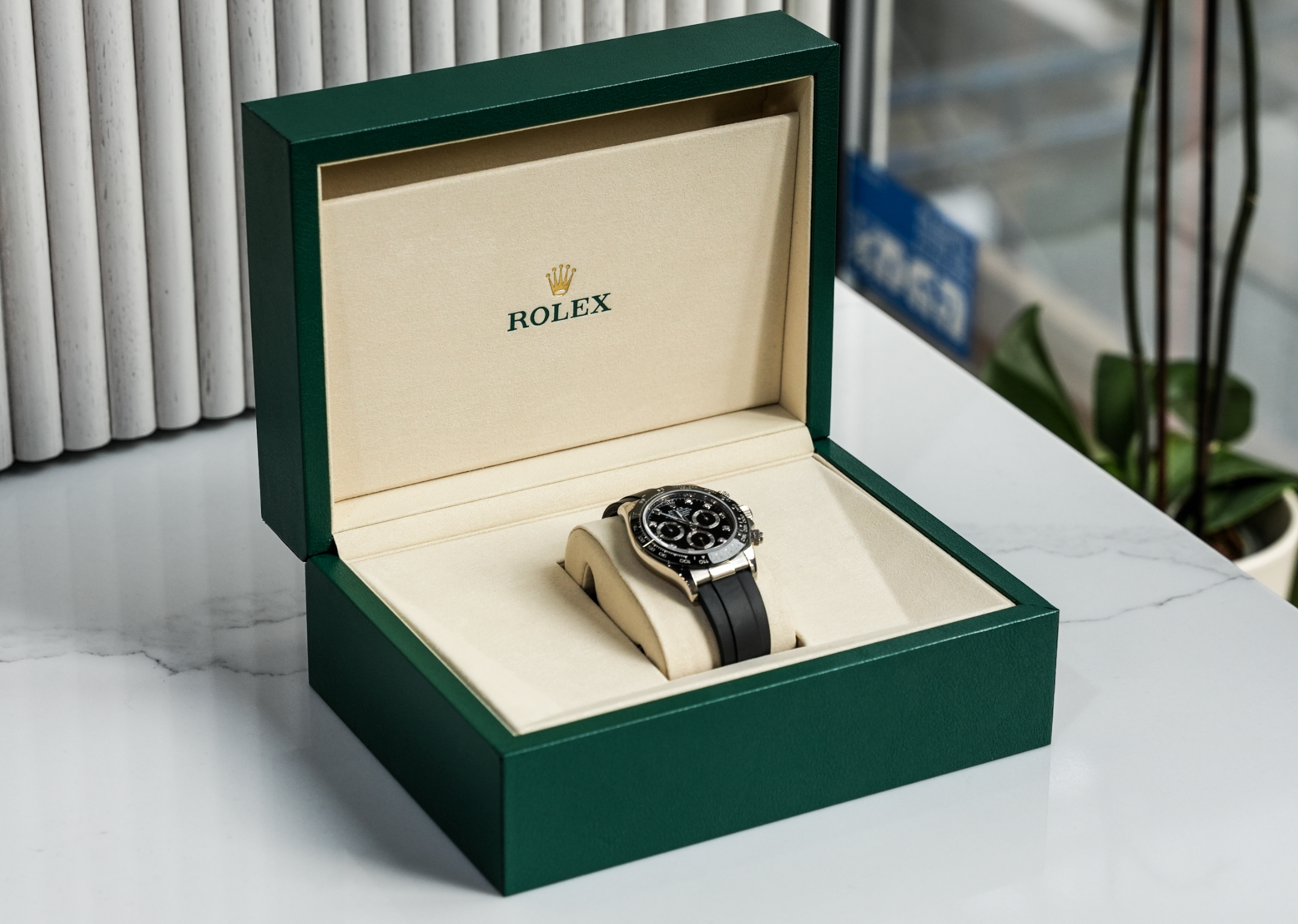 Rolex Cosmograph Daytona – Pre-Owned 18k White Gold with Black Diamond Dial and Oysterflex Bracelet Ref. 116519LN