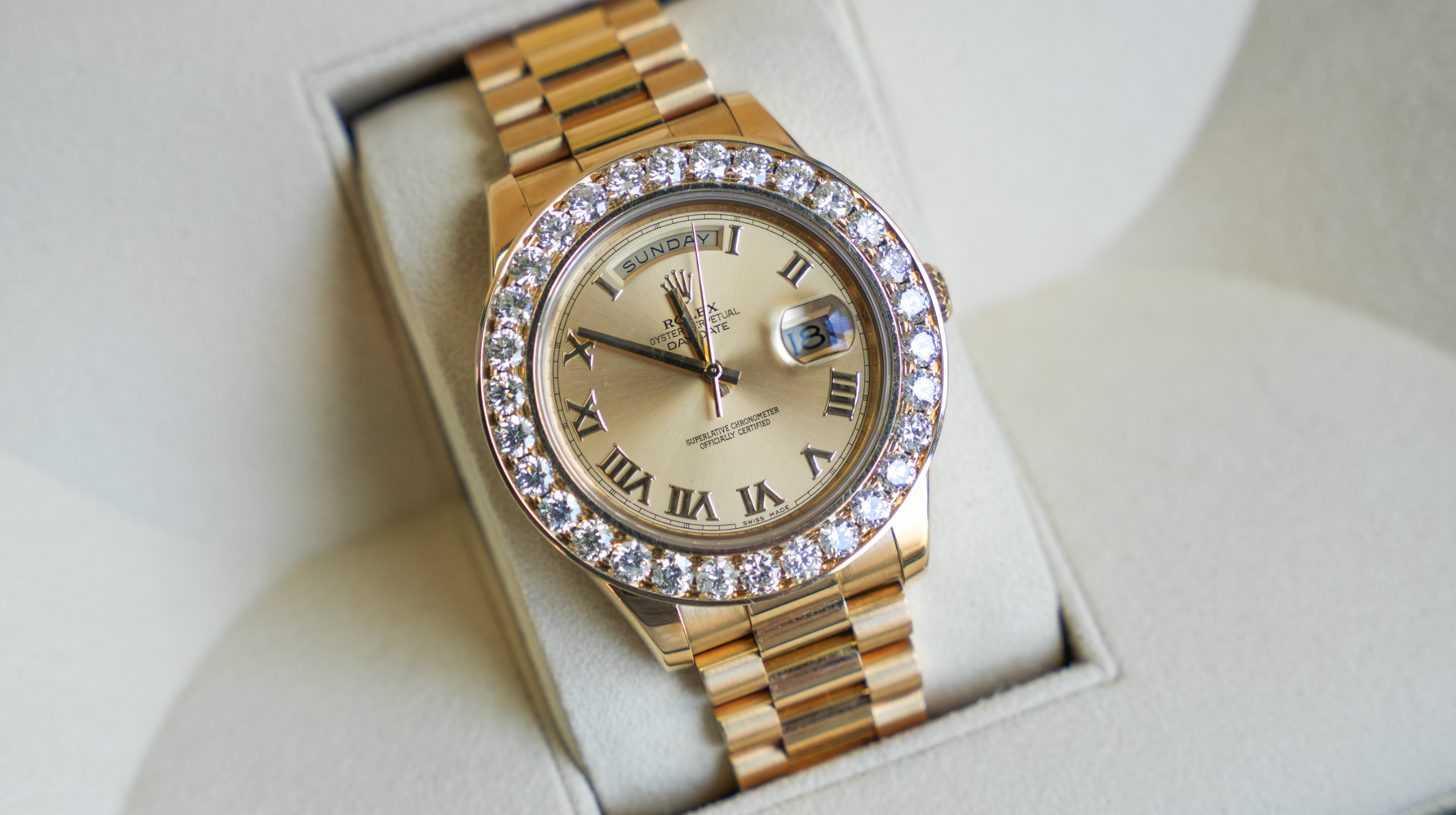 Rolex Day-Date 41 18k Yellow Gold Champagne Roman Dial – Ref. 218238 – Aftermarket Diamond Bezel