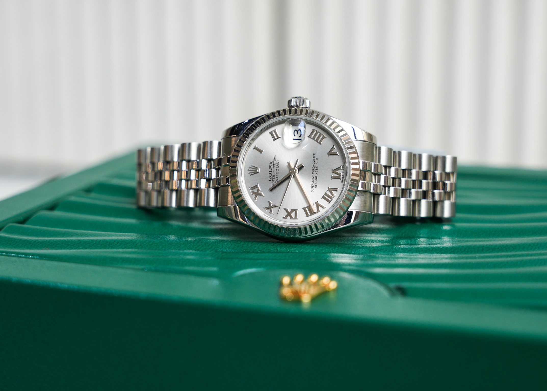 Rolex Datejust 31mm – Stainless Steel with Silver Roman Dial & White Gold Fluted Bezel | Ref. 178274