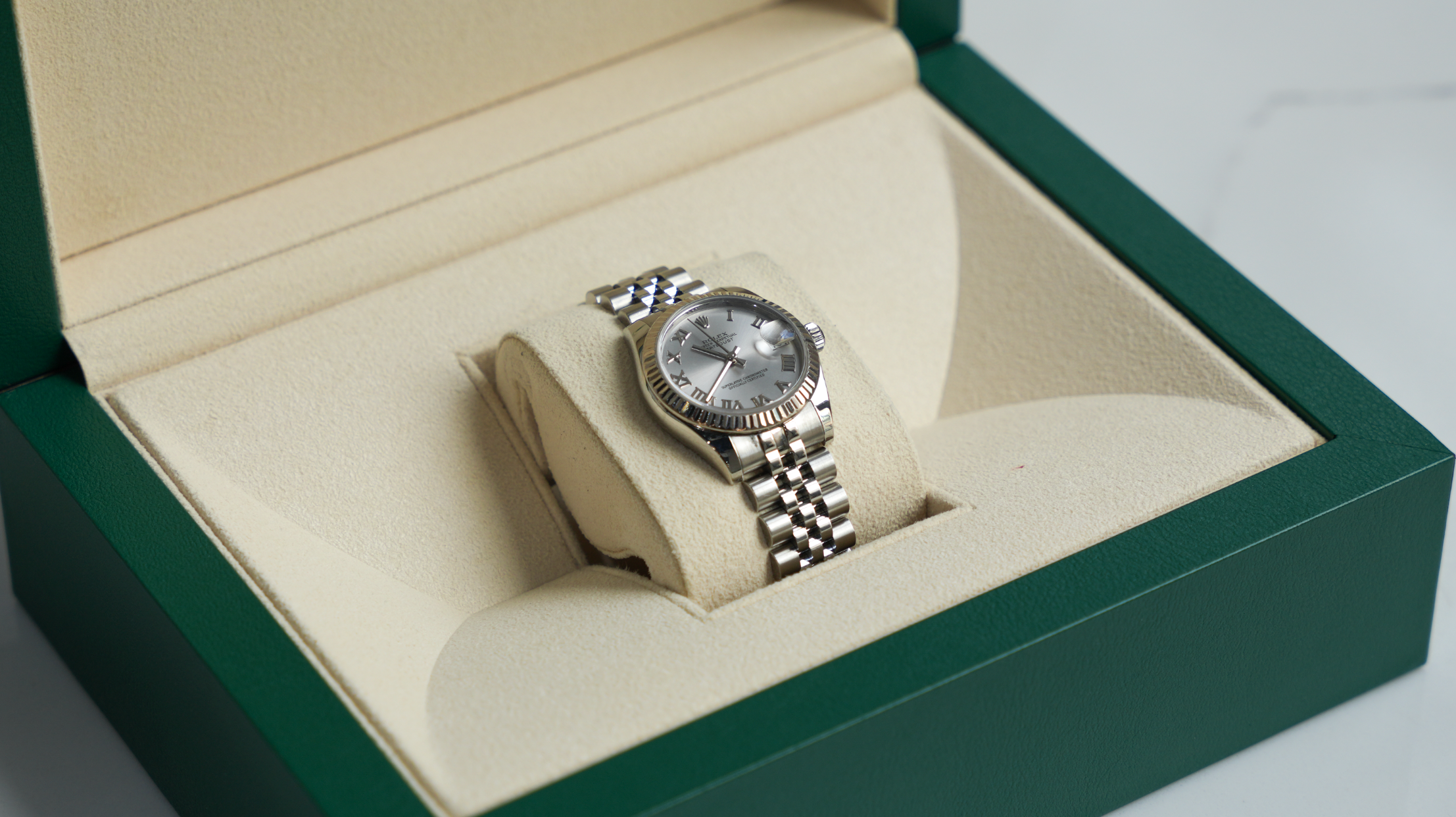 Rolex Datejust 31mm – Stainless Steel with Silver Roman Dial & White Gold Fluted Bezel | Ref. 178274