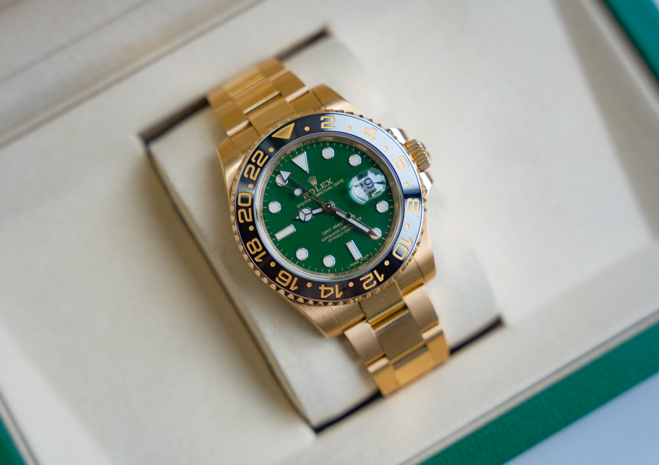 Rolex GMT-Master II 116718LN Green Dial 18K Yellow Gold Black Ceramic Bezel Oyster Bracelet 40mm