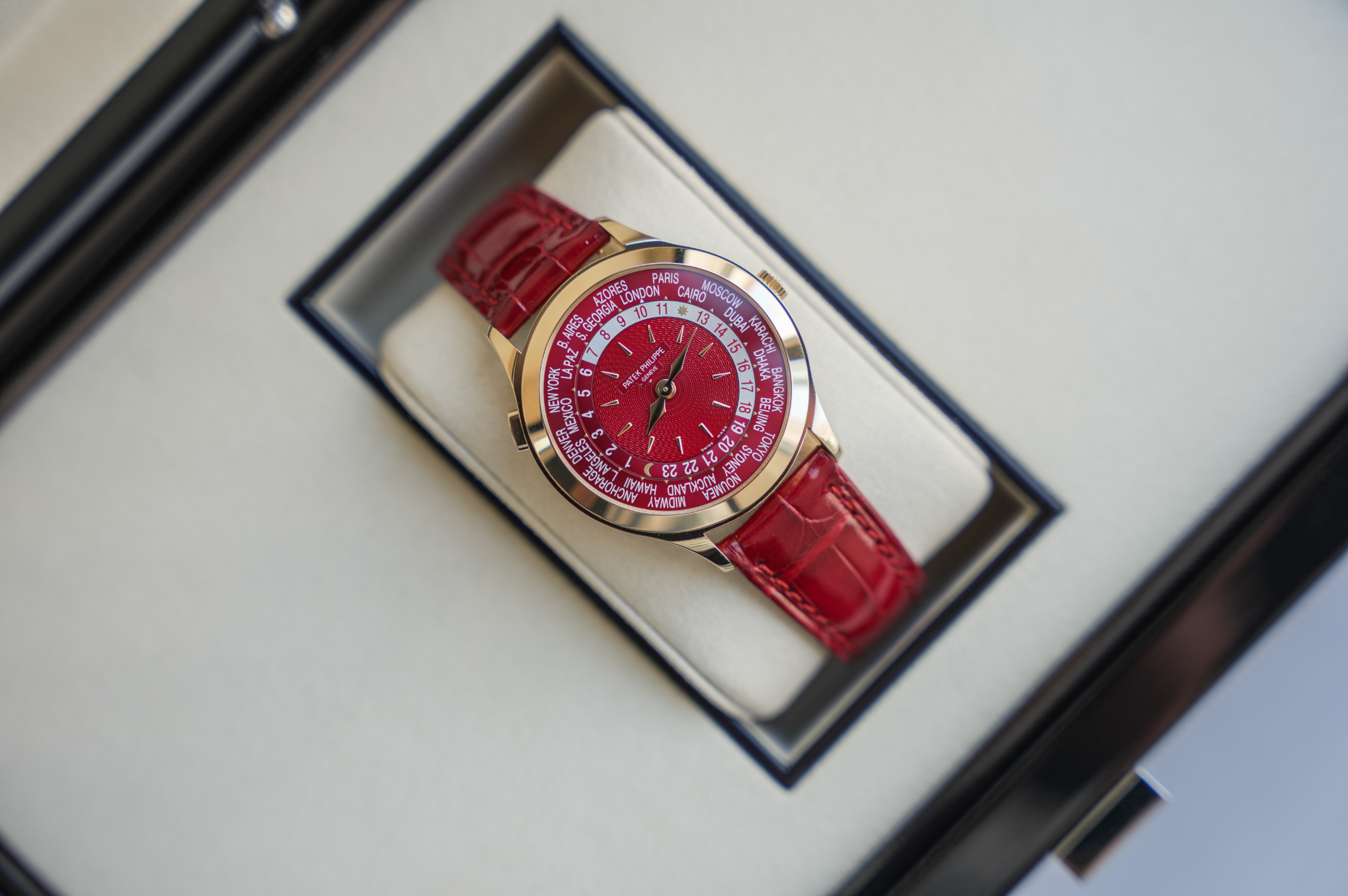 Patek Philippe Complications World Time 7129J-001 18K Yellow Gold Carmine Red Dial