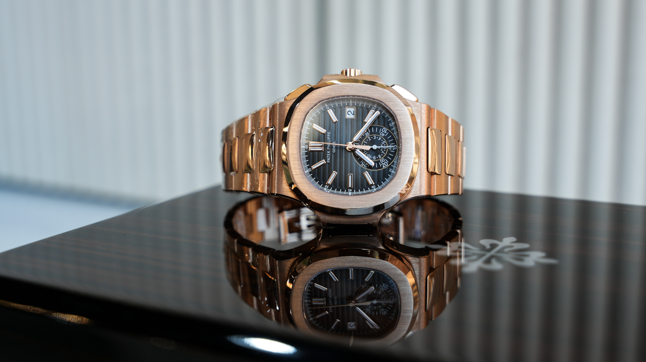 Patek Philippe Nautilus Chronograph 5980/1R-001 – 40.5mm Rose Gold with Black Dial