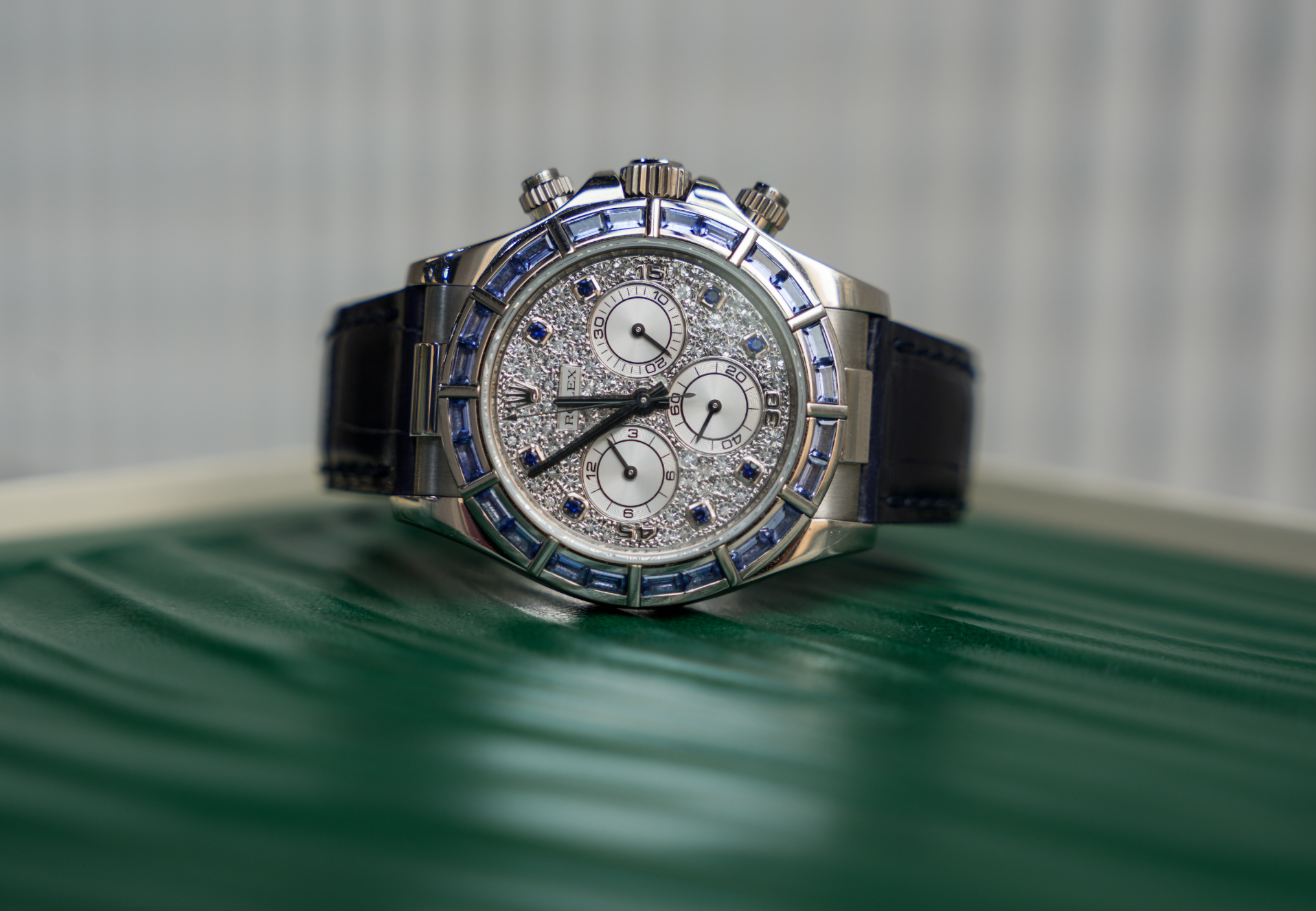 Rolex Cosmograph Daytona 40mm 18K White Gold Blue Sapphire Bezel Diamond Pavé Dial Blue Alligator Strap – Ref. 116589SACI