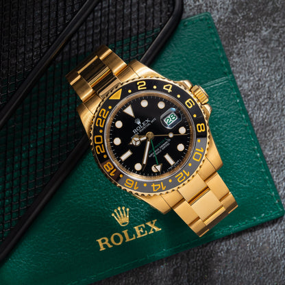 Rolex GMT Master II 116718 40MM Black Dial With Yellow Gold OysterBracelet