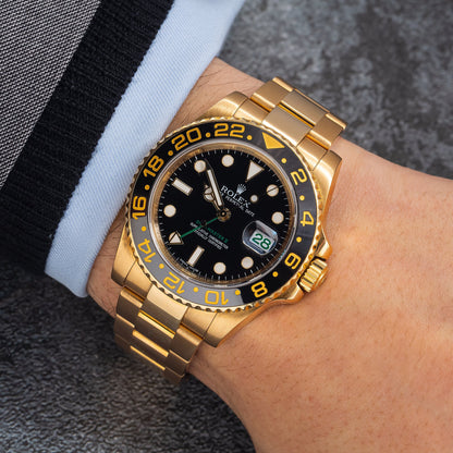 Rolex GMT Master II 116718 40MM Black Dial With Yellow Gold OysterBracelet